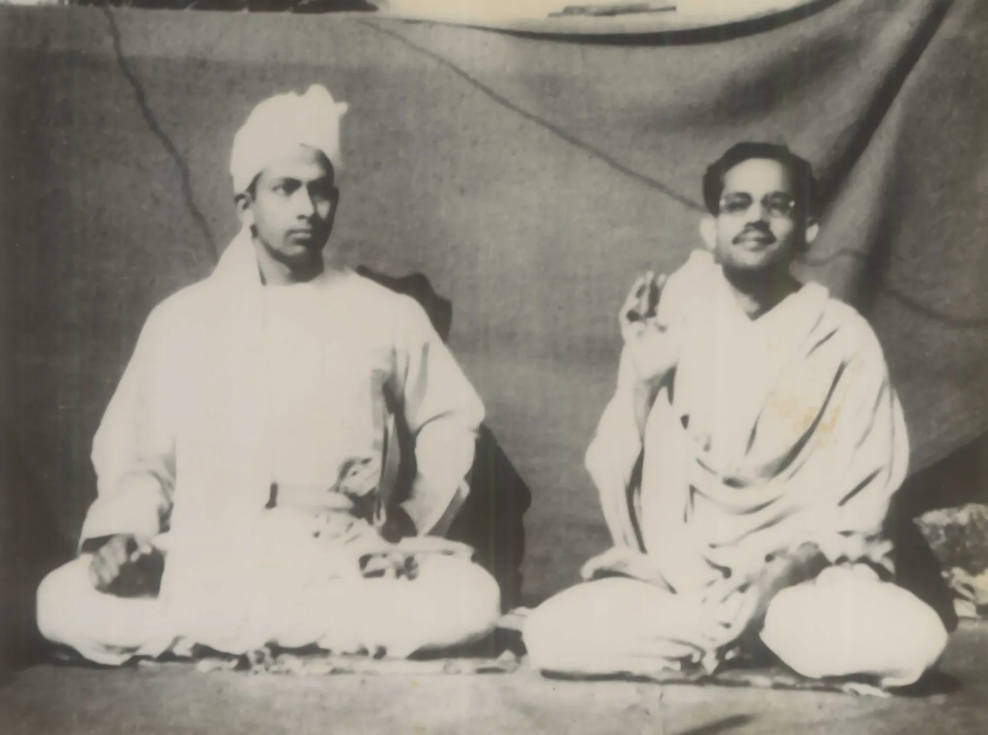 Young Shrii Shrii Anandamurti seated in meditation with a devotee, early years