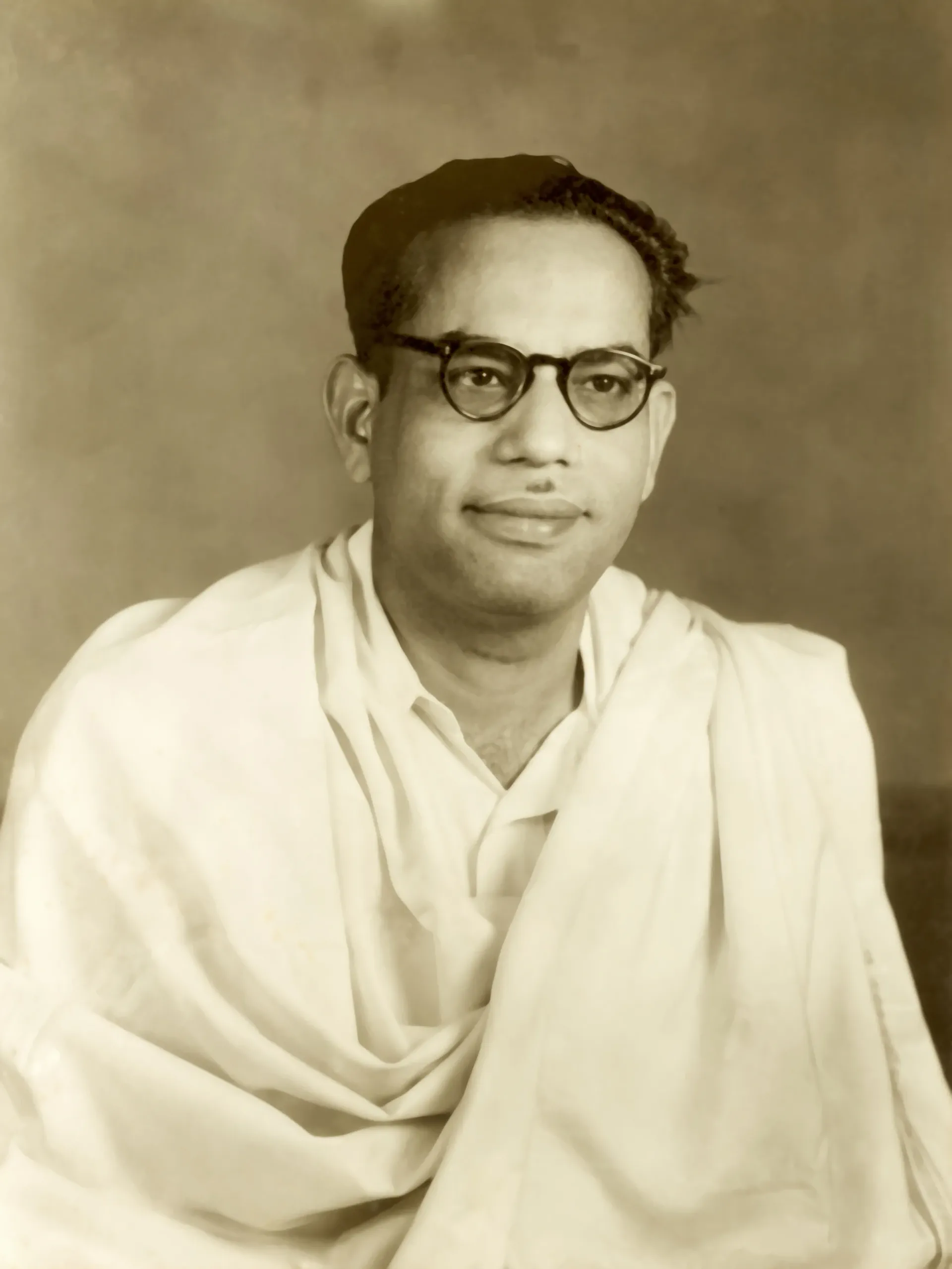 Young Shrii Shrii Anandamurti — seated portrait