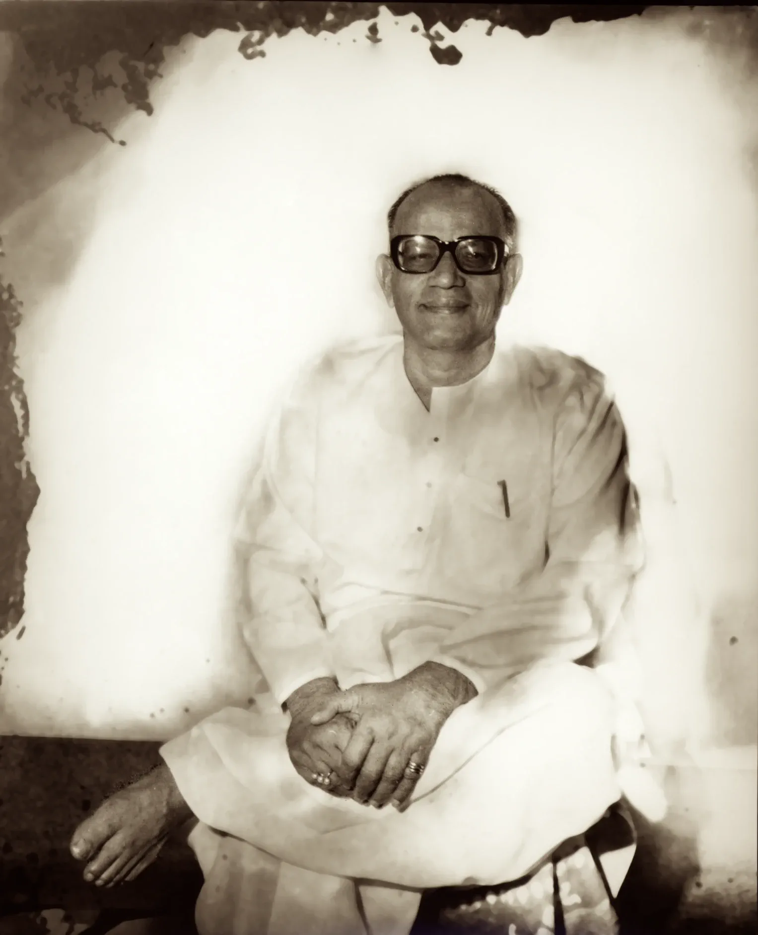 Shrii Shrii Anandamurti — seated portrait from an aged print