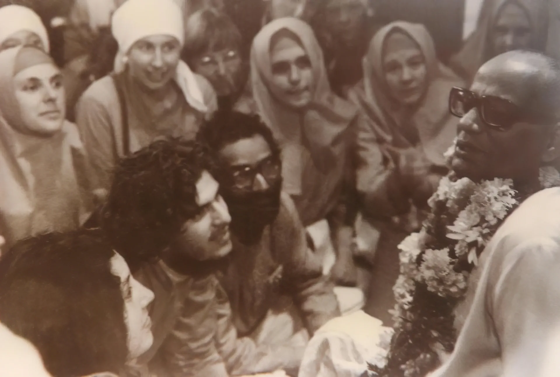 Shrii Shrii Anandamurti among devotees at a close gathering